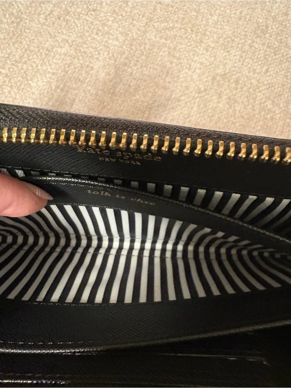 kate spade Black Zip-Around Wallet with Gold Logo